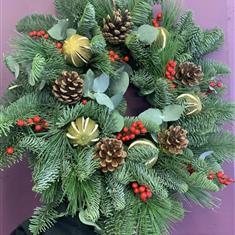 Christmas door wreath including cones  Ilex And  whole limes