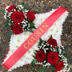 Massed cushion with personalised ribbon 2