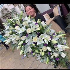 White &amp; purple casket spray