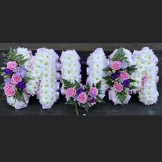 MUM tribute ribbon edged in pretty pinks and purples