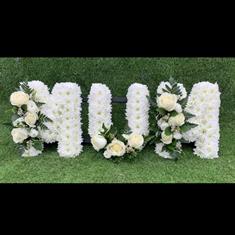 MUM tribute in whites 