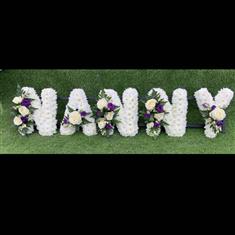 NANNY tribute in purples and whites
