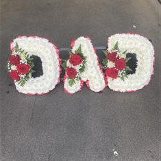 DAD tribute with red ribbon edging