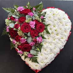Massed Heart With Red Roses And Pink Carnations 